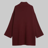 Maroon sweater on a white background