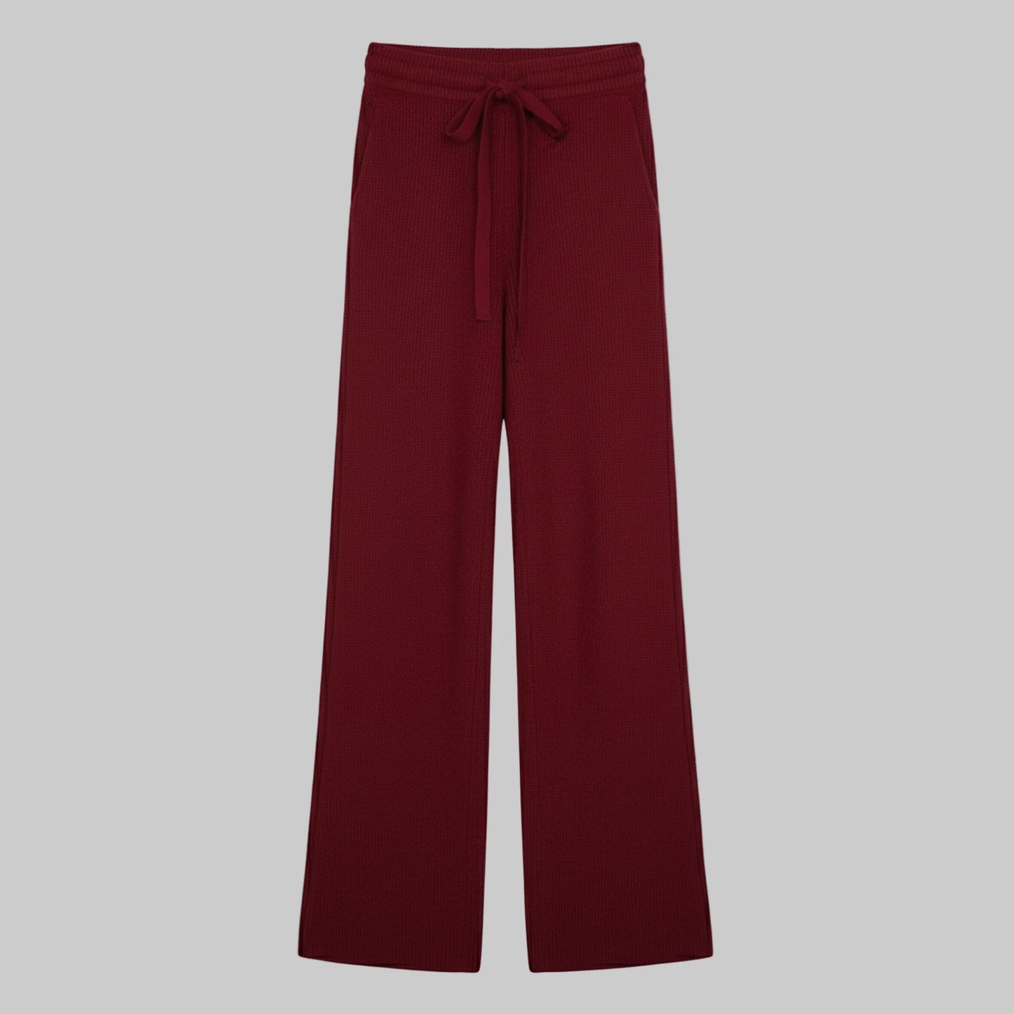 Maroon wide-leg pants with a tie waist on a white background