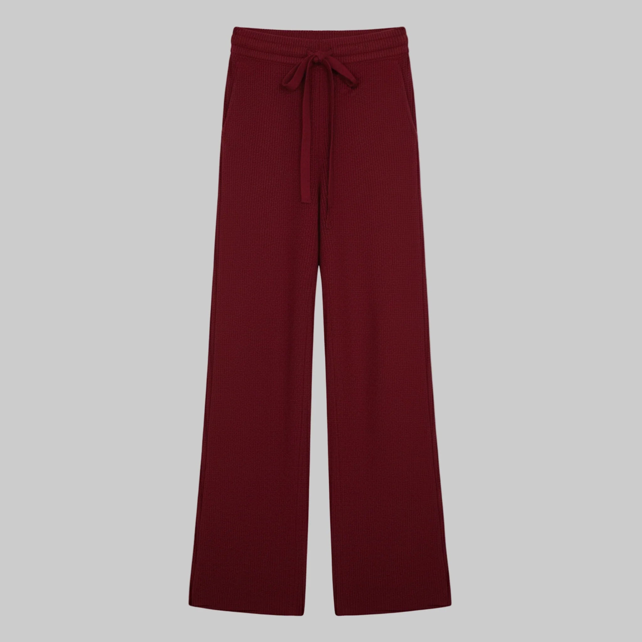 Maroon wide-leg pants with a tie waist on a white background