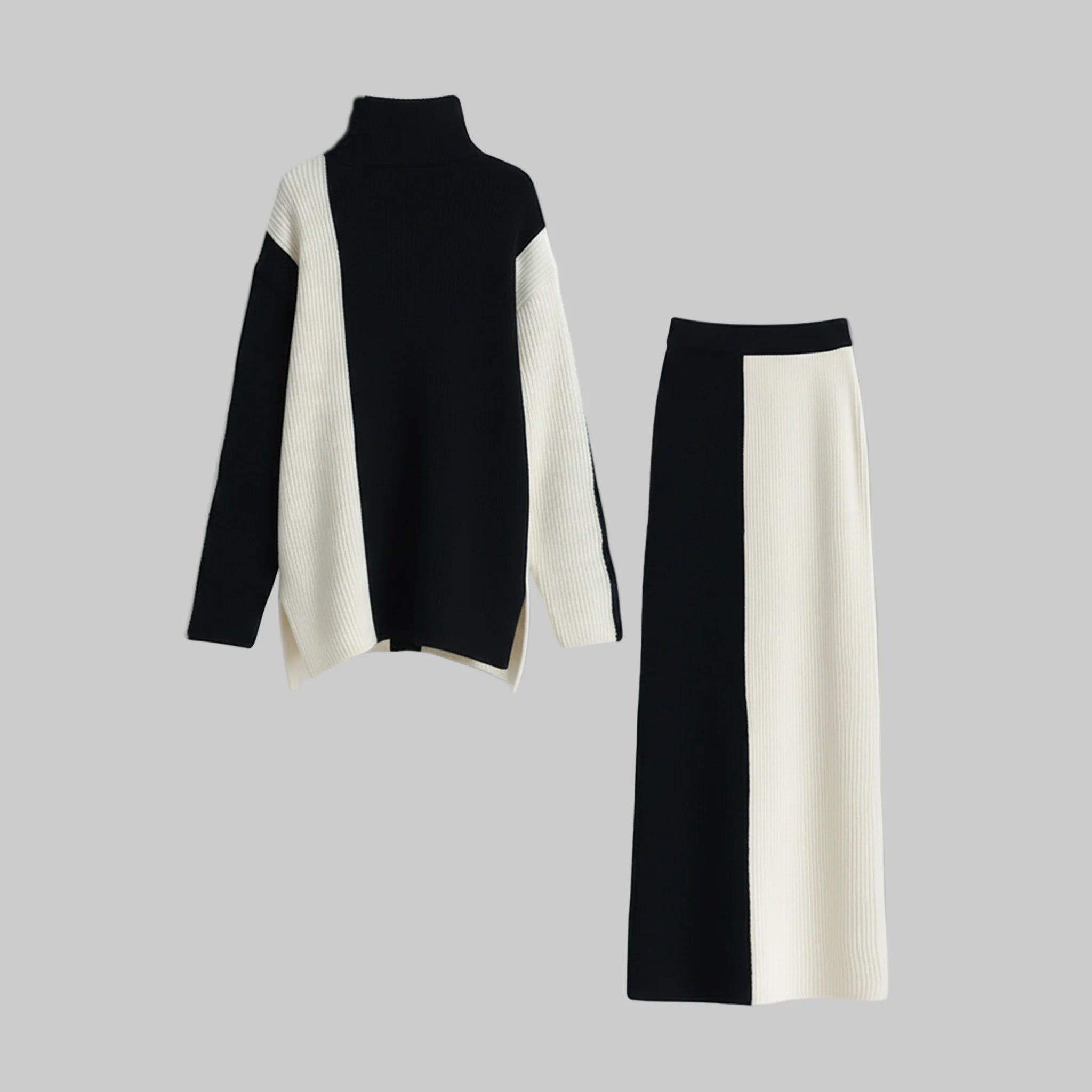 Black and white turtleneck sweater and skirt set on a light gray background