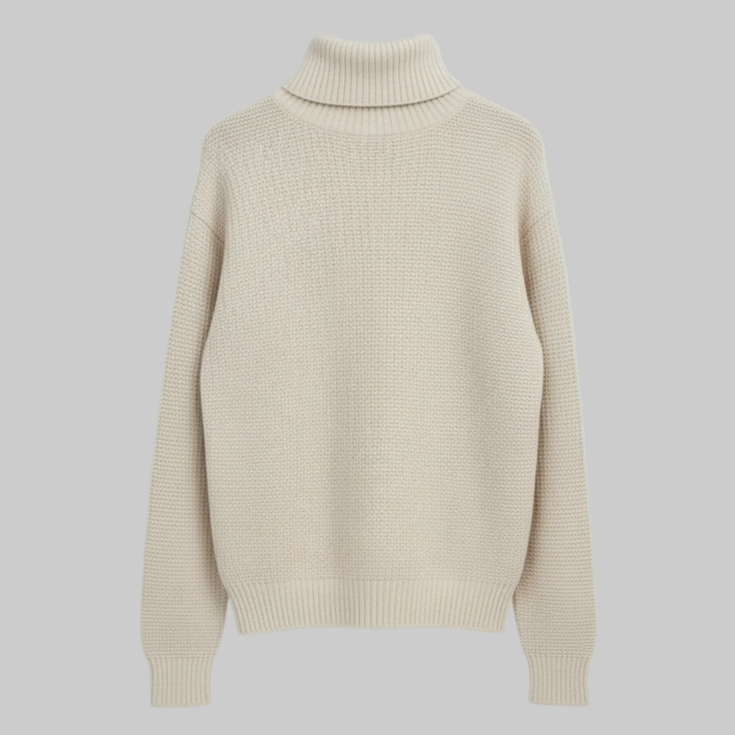 Beige turtleneck sweater on a light gray background