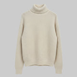 Beige turtleneck sweater on a light gray background
