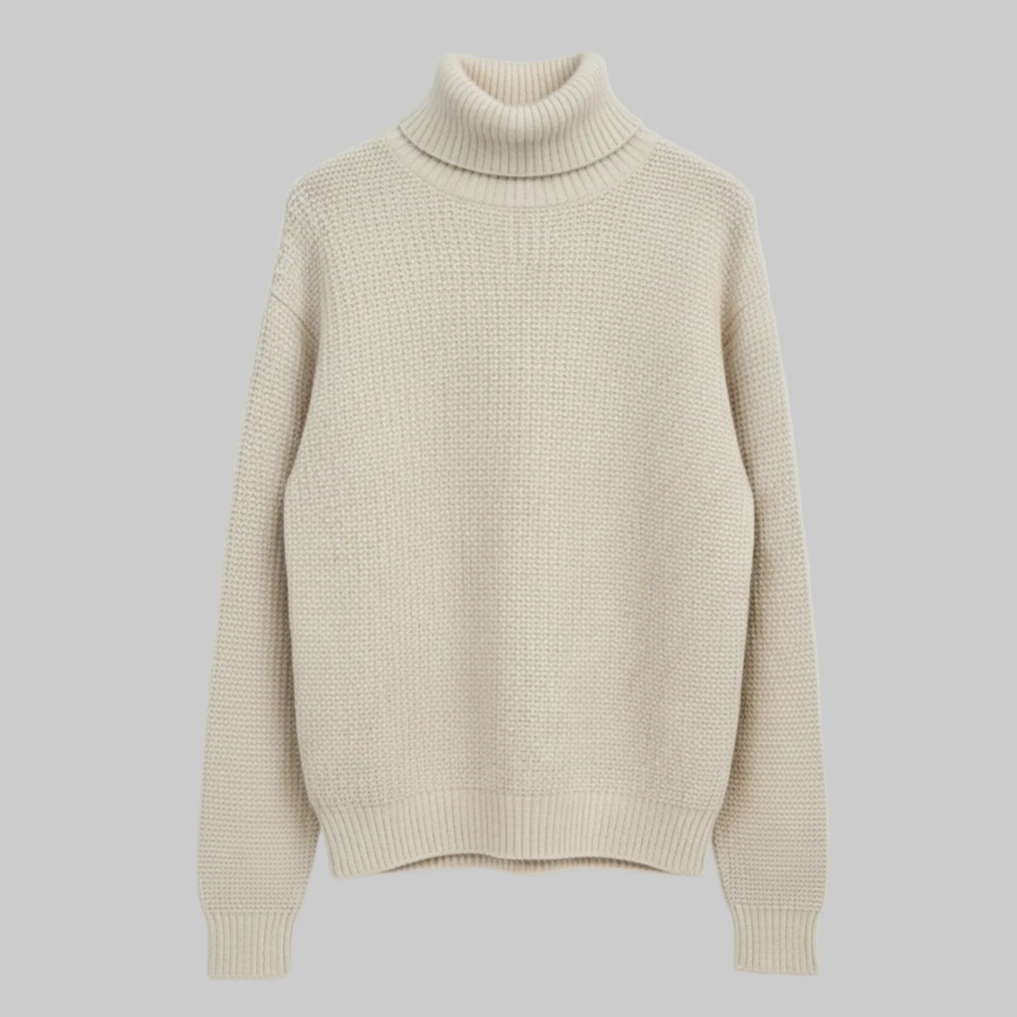 Beige turtleneck sweater on a light gray background