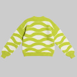 Green and white striped sweater on a gray background