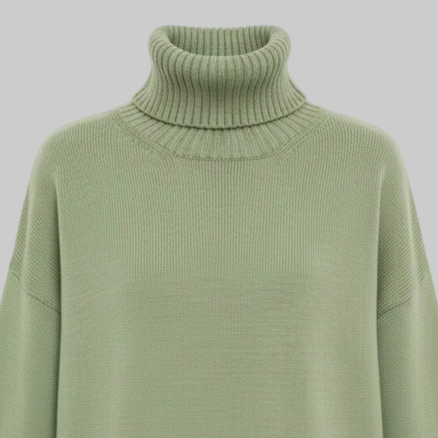 Green turtleneck sweater on a white background