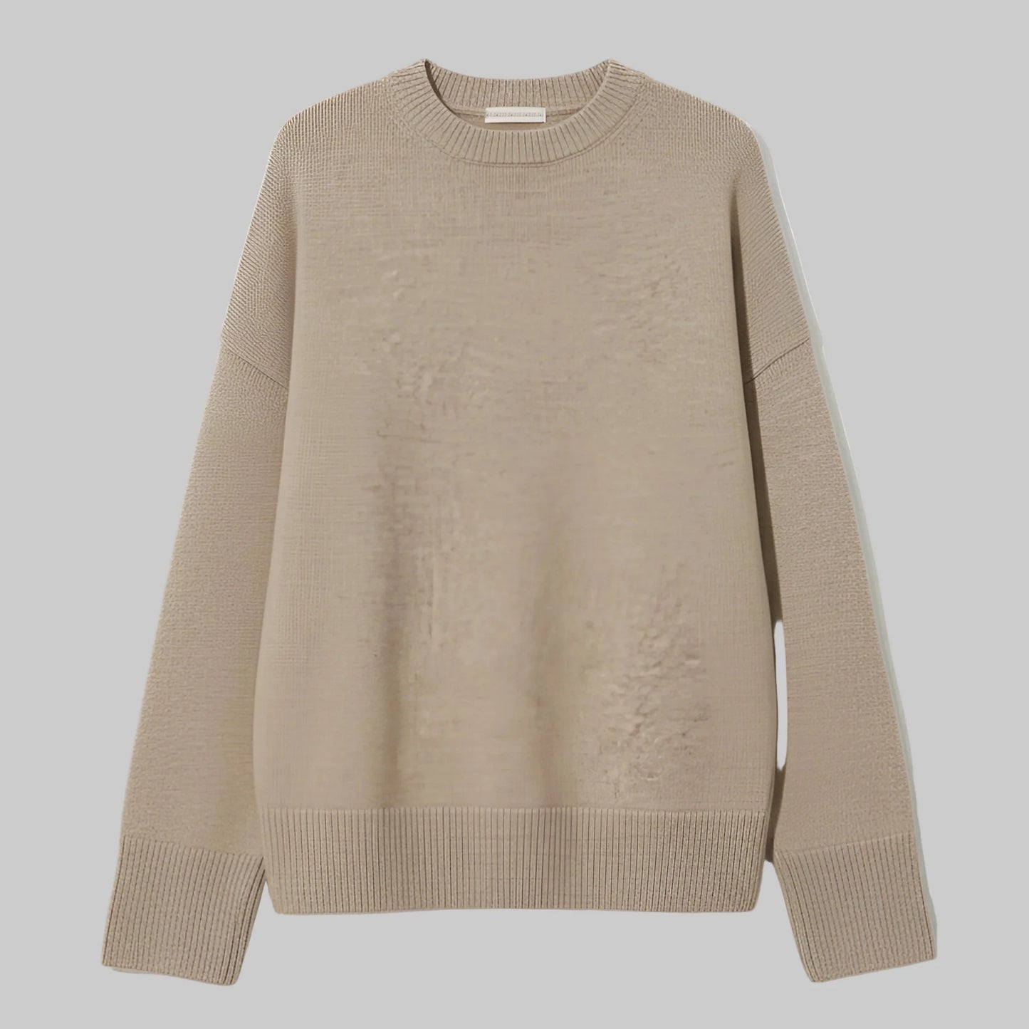 Beige sweater on a light beige background