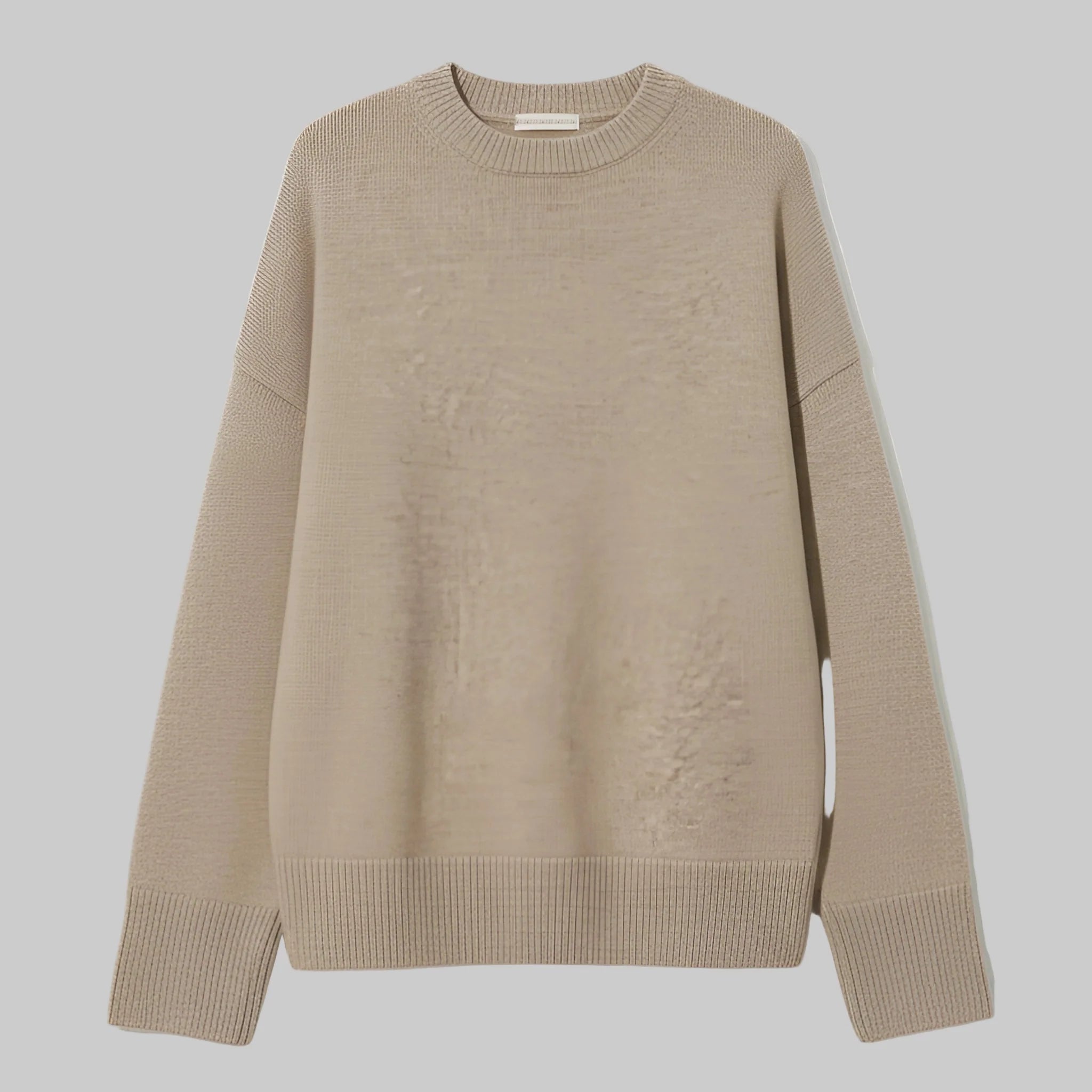 Beige sweater on a light beige background
