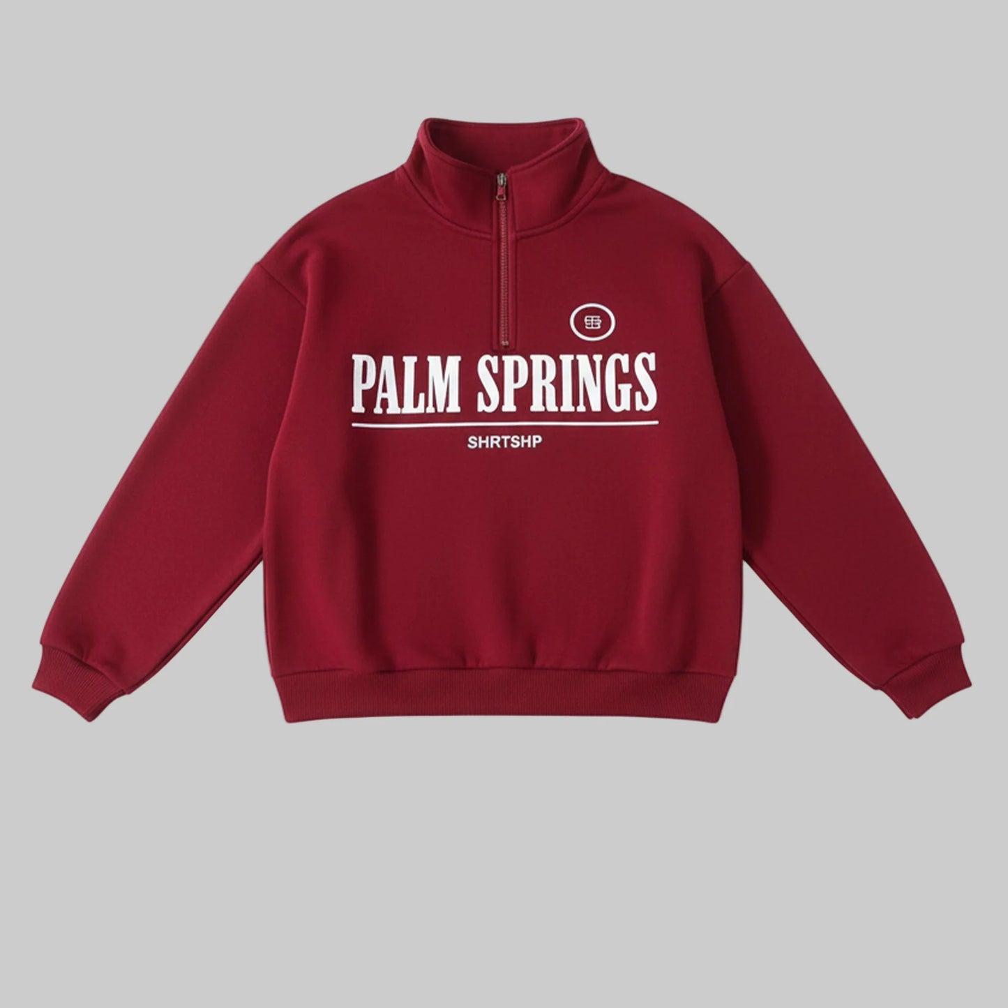 Red sweatshirt with 'Palm Springs' text on a white background
