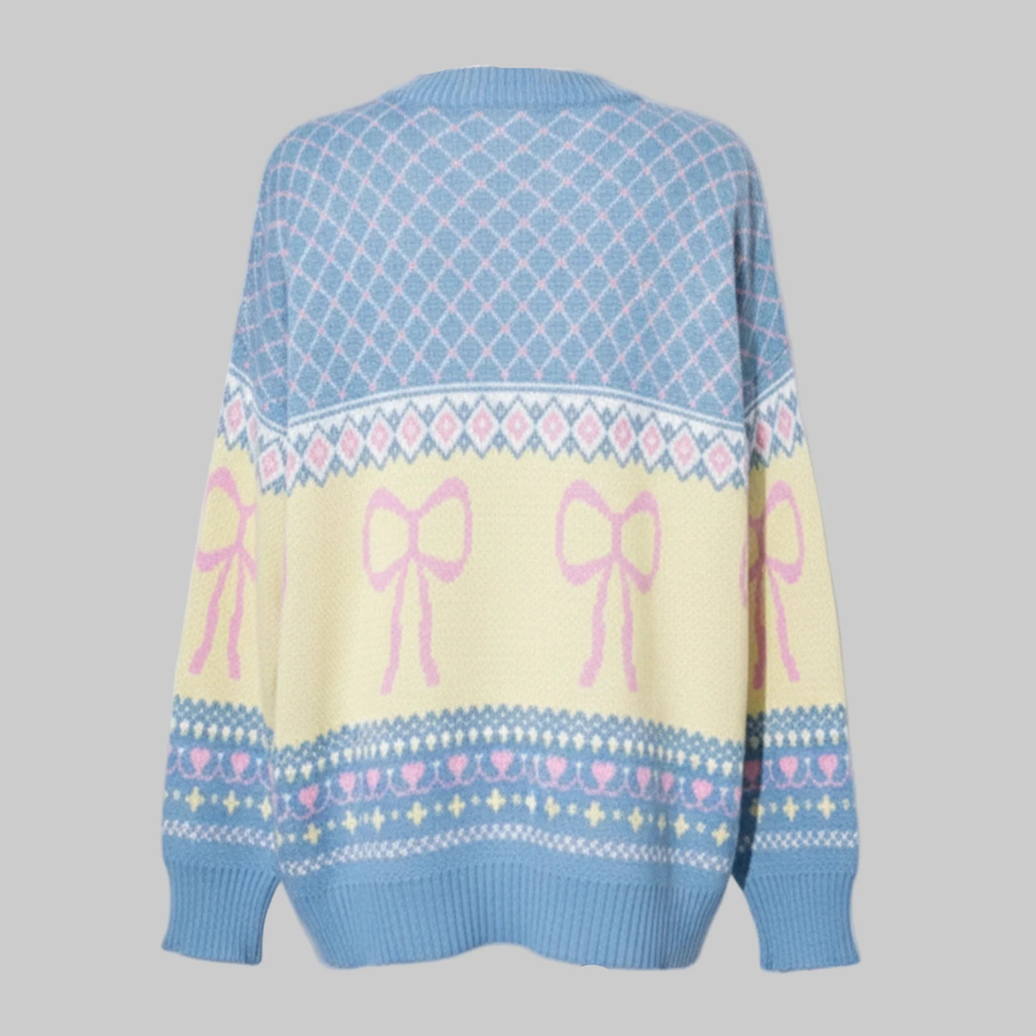 Sweater with pink bows and decorative patterns on a gray background