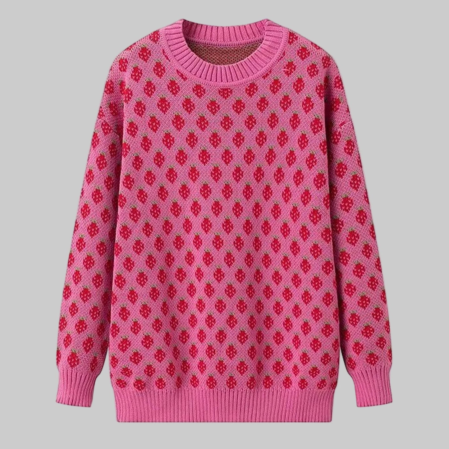 Pink sweater with red pattern on a white background