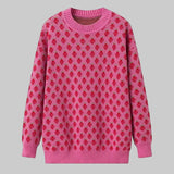 Pink sweater with red pattern on a white background