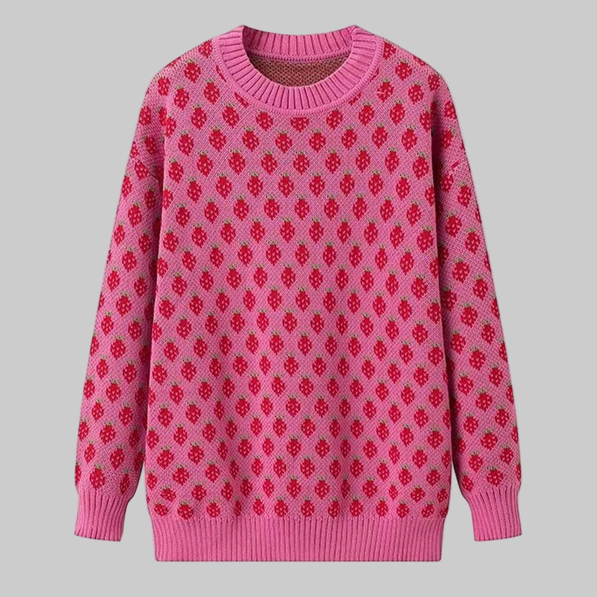 Pink sweater with red pattern on a white background