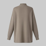 Beige sweater on a white background